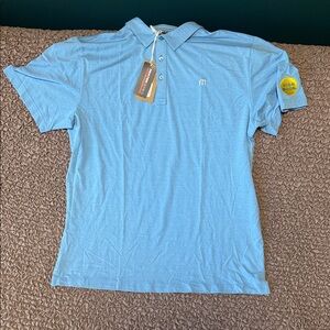 Travis Mathew golf polo. Brand new with tags. XL
Heater Series performance